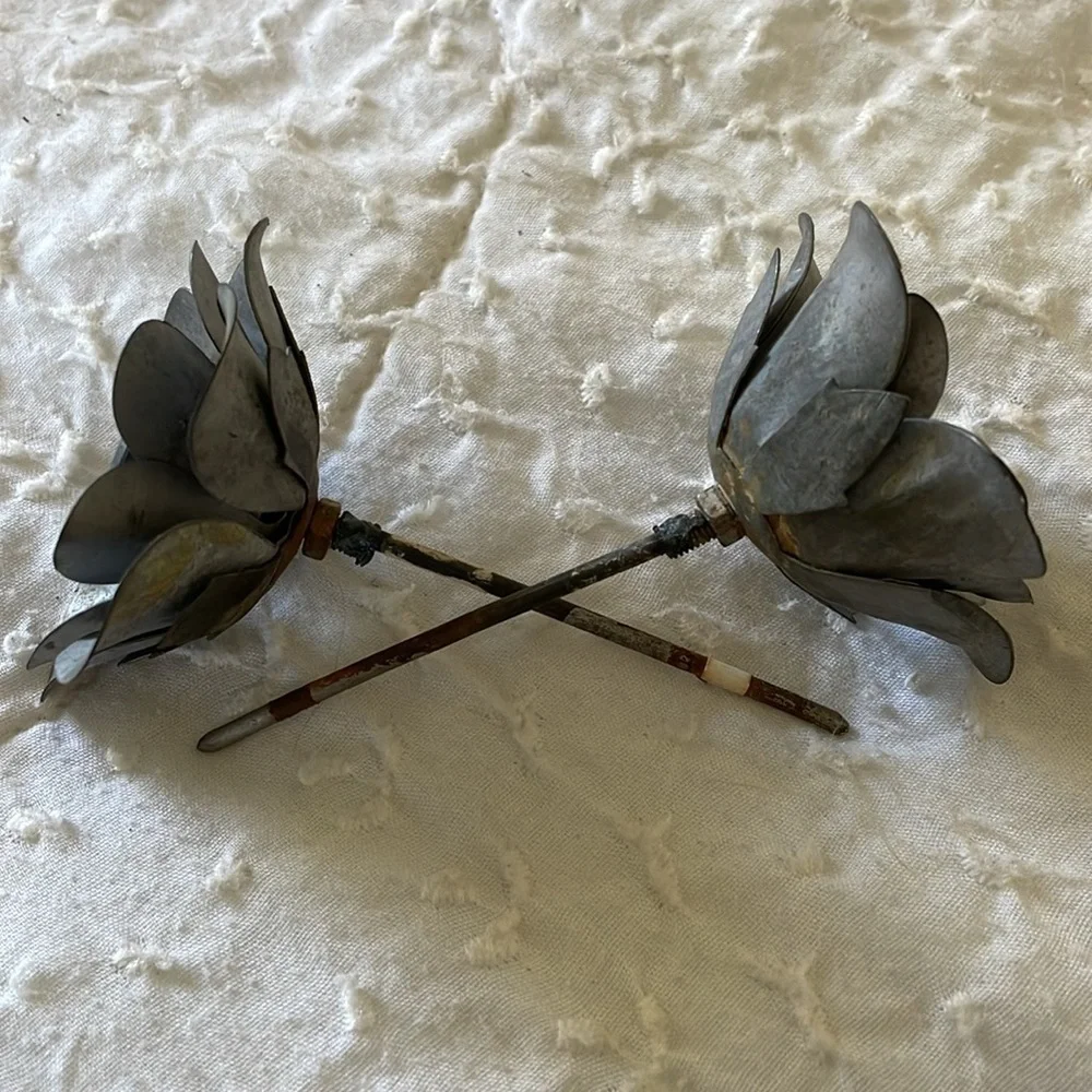 Metal flowers. Lot of 2. Handmade. 3 inches wide. 4 inches tall.